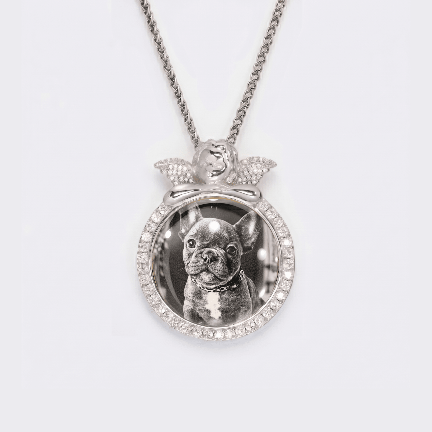 The front side of CRNCY's regular size Angel Photo Pendant with a silver finish. The front side features prong-set diamonds around the photo, angel, and bale. The front side shows the customer's photo selection.