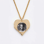 The back side of CRNCY's Brother Heart Photo Pendant. The back side has a polished appearance with a circular photo place directly in the center. The photo is selected by the customer.