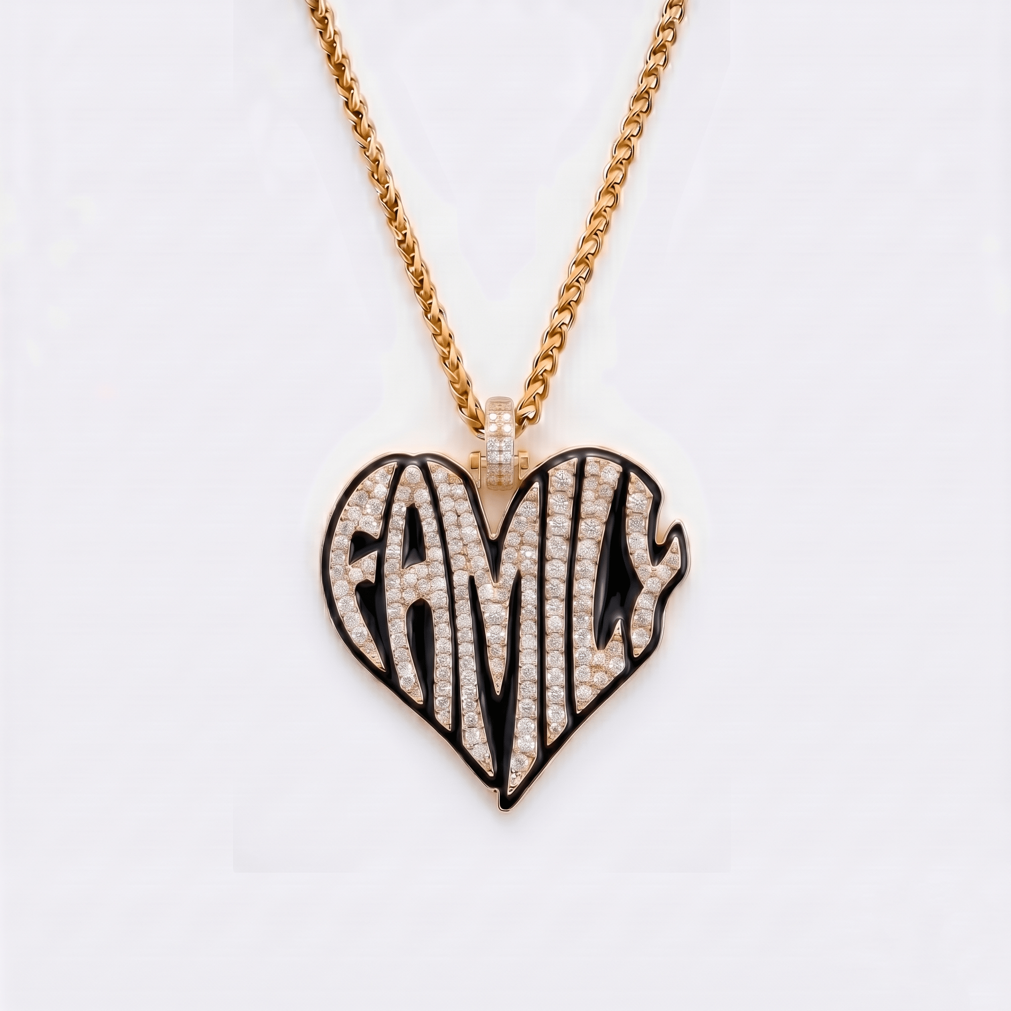 The front side of CRNCY's Family Heart Photo Pendant with a 14k gold finish and black jewelry enamel. The front side features prong-set diamonds placed inside each letter, surrounded by colored jewelry enamel to outline the letters. 