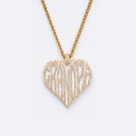 The front side of CRNCY's Grandpa Heart Photo Pendant with a 14k gold finish. The front side features prong-set diamonds placed inside each letter, surrounded by colored jewelry enamel to outline the letters. 