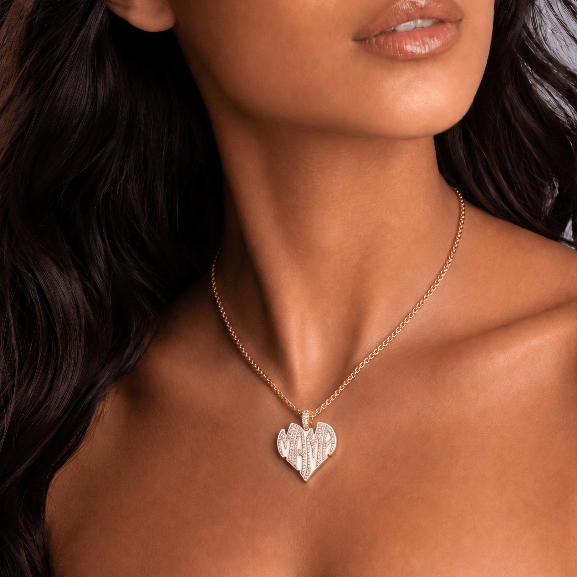 Female model wearing CRNCY's Mama Heart Photo Pendant with a 14k gold finish and a 16 inch length necklace.
