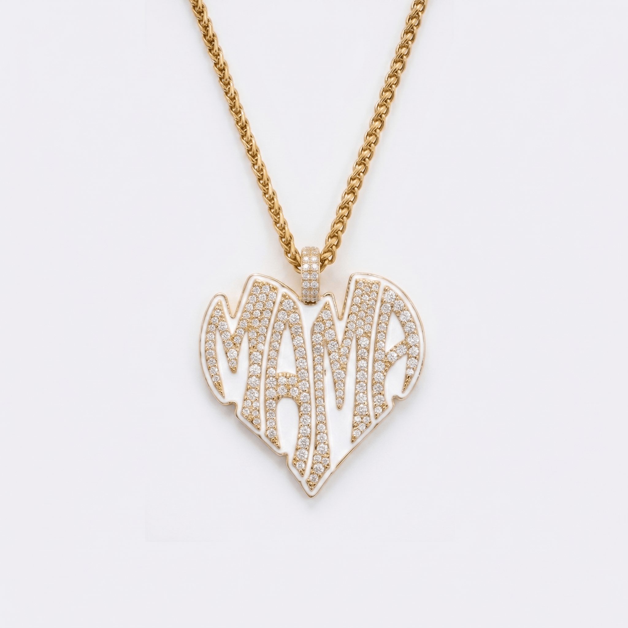 The front side of CRNCY's Mama Heart Photo Pendant with a 14k gold finish. The front side features prong-set diamonds placed inside each letter, surrounded by colored jewelry enamel to outline the letters. 