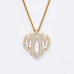 The front side of CRNCY's Mom Heart Photo Pendant with a 14k gold finish. The front side features prong-set diamonds placed inside each letter, surrounded by colored jewelry enamel to outline the letters. 