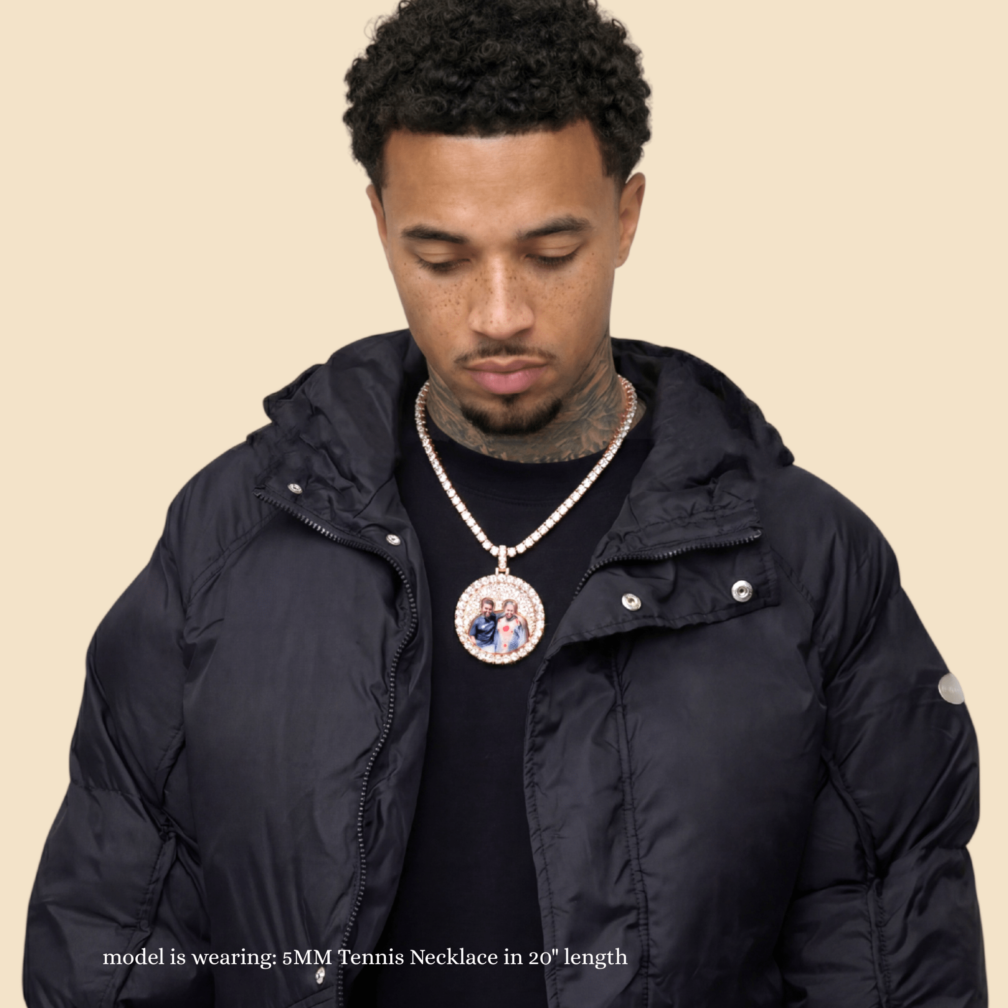 Male model wearing CRNCY's Iced Silhouette Photo Pendant in a rose gold finish, with a 20 inch 5MM Tennis Necklace.