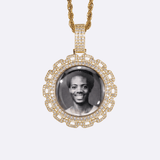 The front side of CRNCY's Regular size Link Photo Pendant with a 14k gold finish. The front side features prong-set diamonds around the photo and on the bale. The front side shows the customer's photo selection.